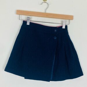 Boden wool blend navy blue wrap front classic pleated skirt. Size 9–10.